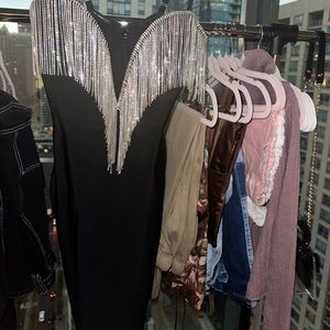 Medium, black dresses, only worn once, very accentuating for curves